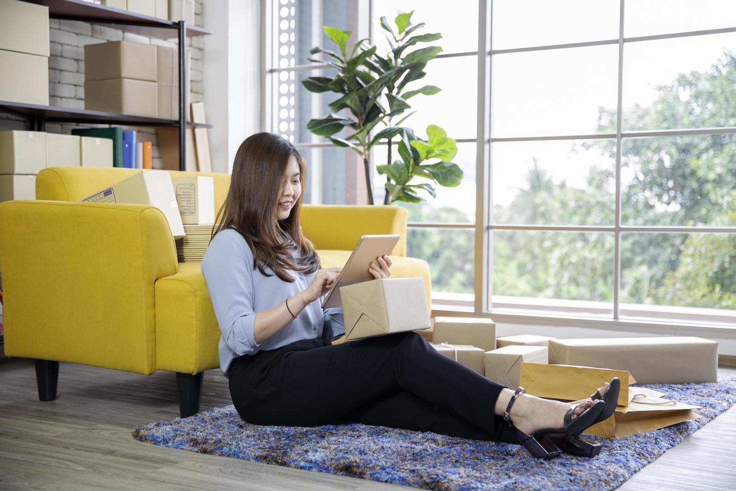 Young businesswoman having success with a new order from customer photo