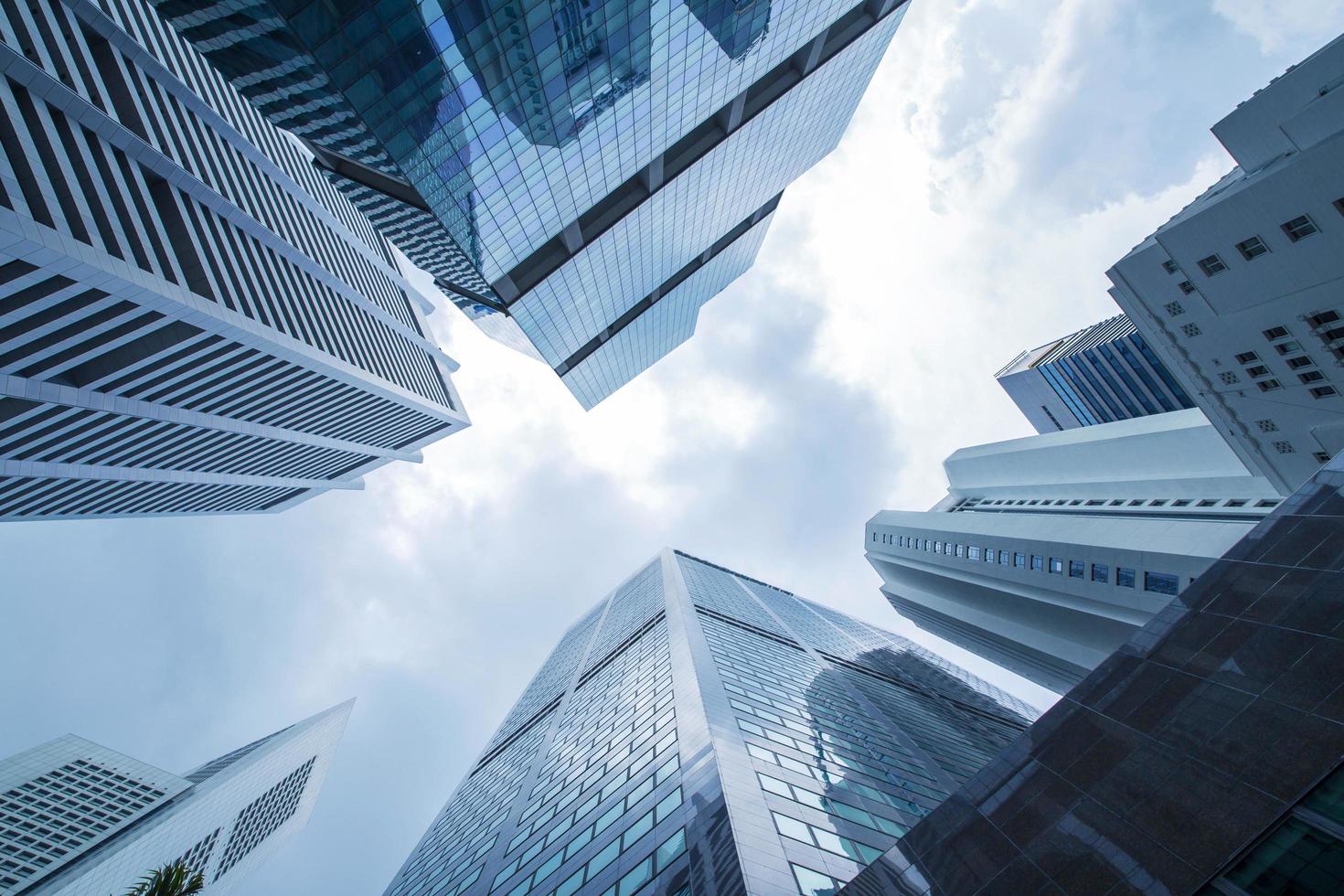 View of modern business skyscraper glass and sky view landscape of commercial building in a central city photo