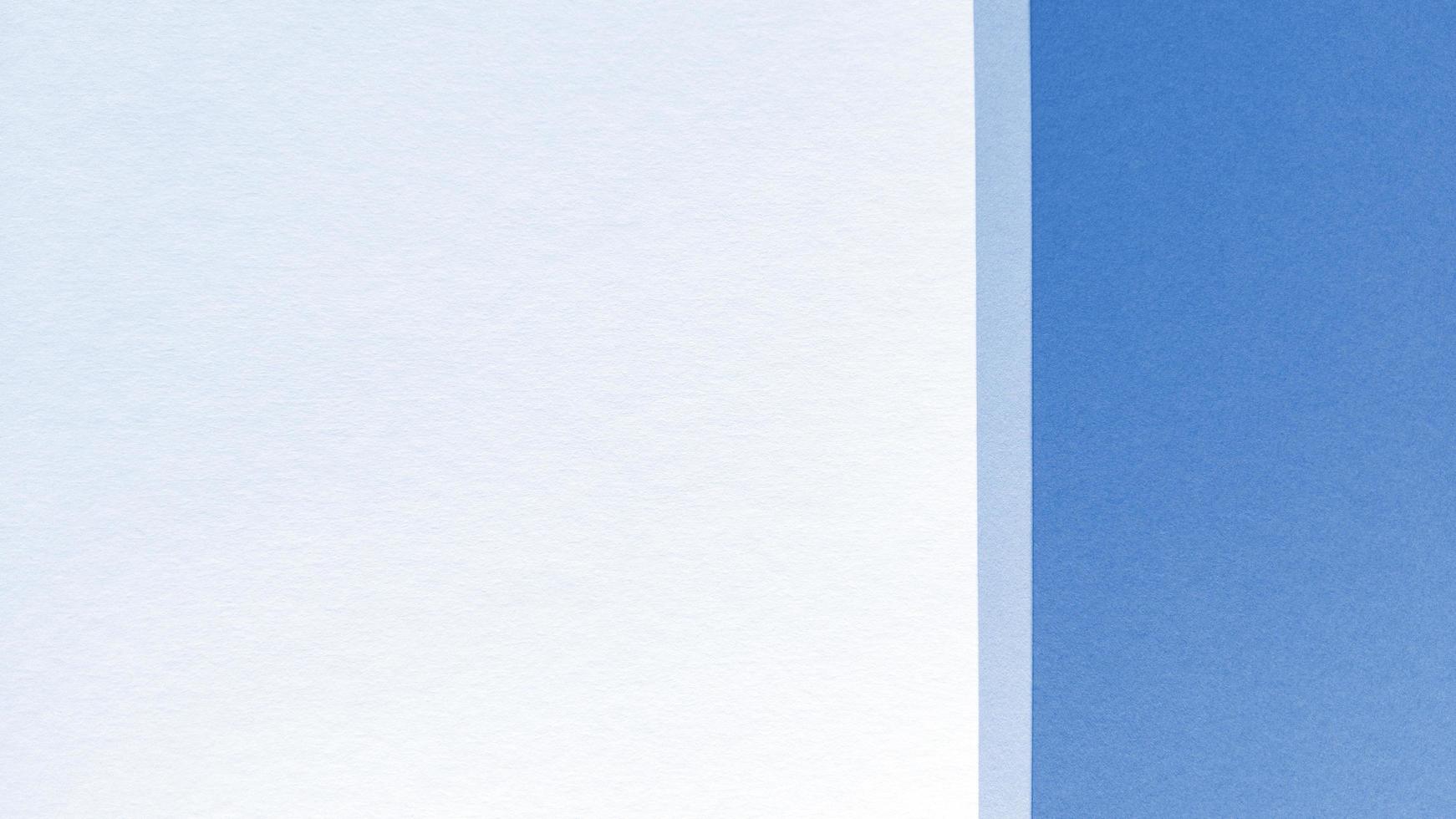 Simple flat lay with pastel texture. Blue and white paper background. Stock photo. photo