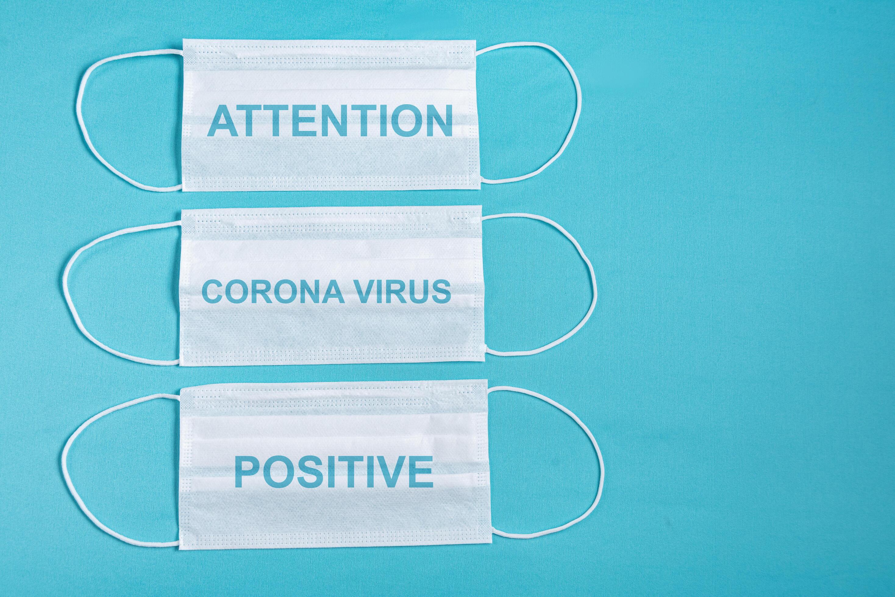 Surgical masks over minimalist blue background 2287571 Stock Photo at