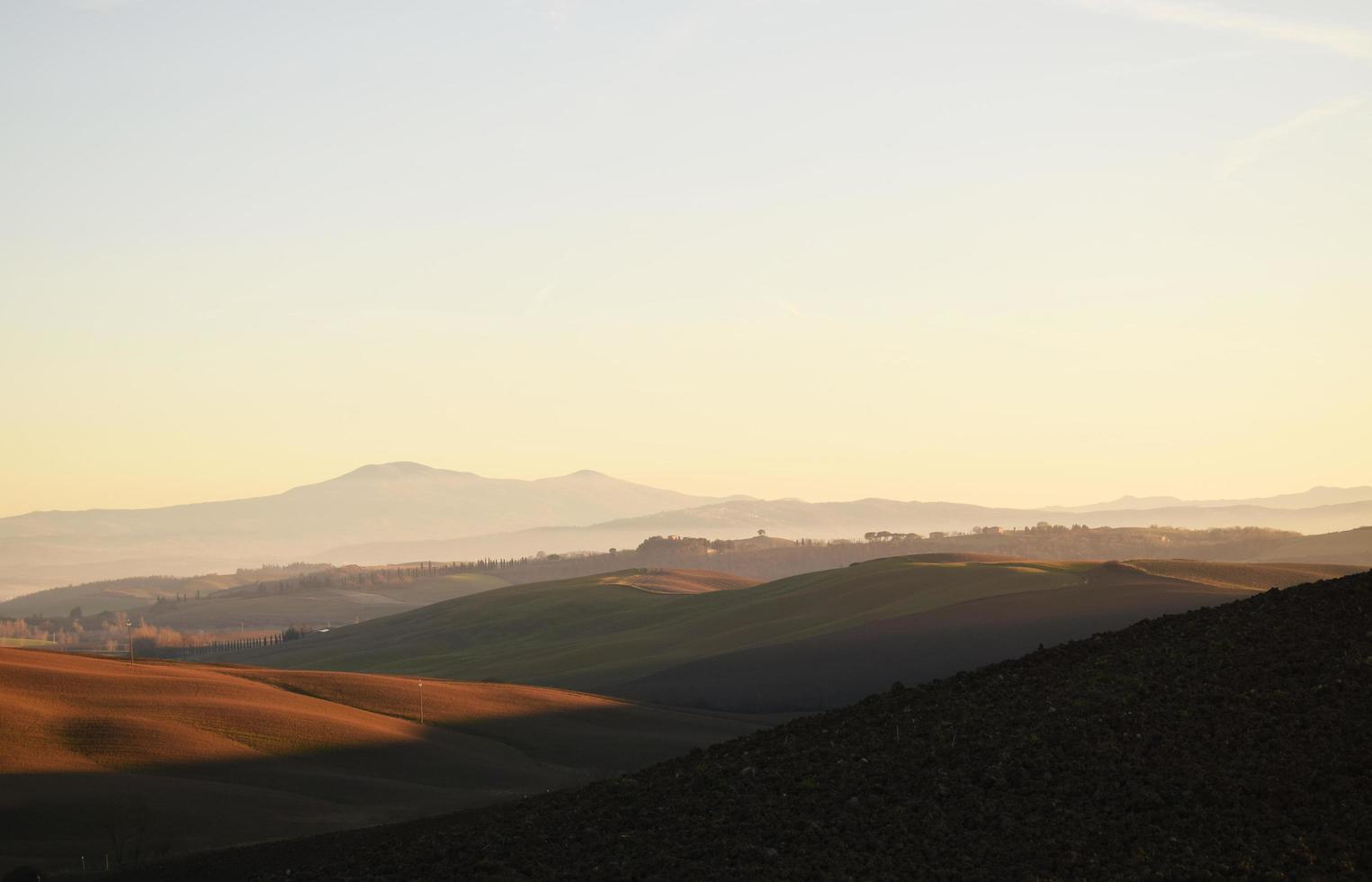 Mountain countryside during sunset photo