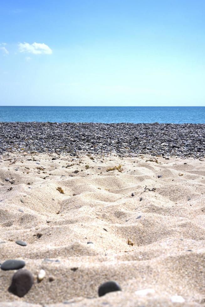 Sand and pebbles on a beach near Yevpatoria, Crimea photo