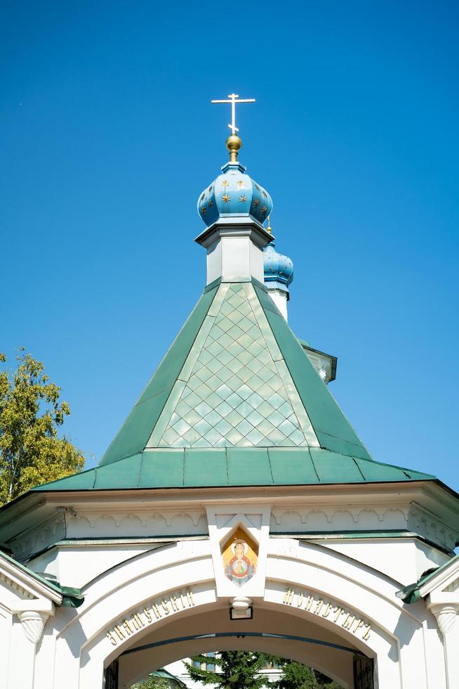 Landscape with a view of the Znamensky Monastery with a clear blue sky in Irkutsk, Russia photo