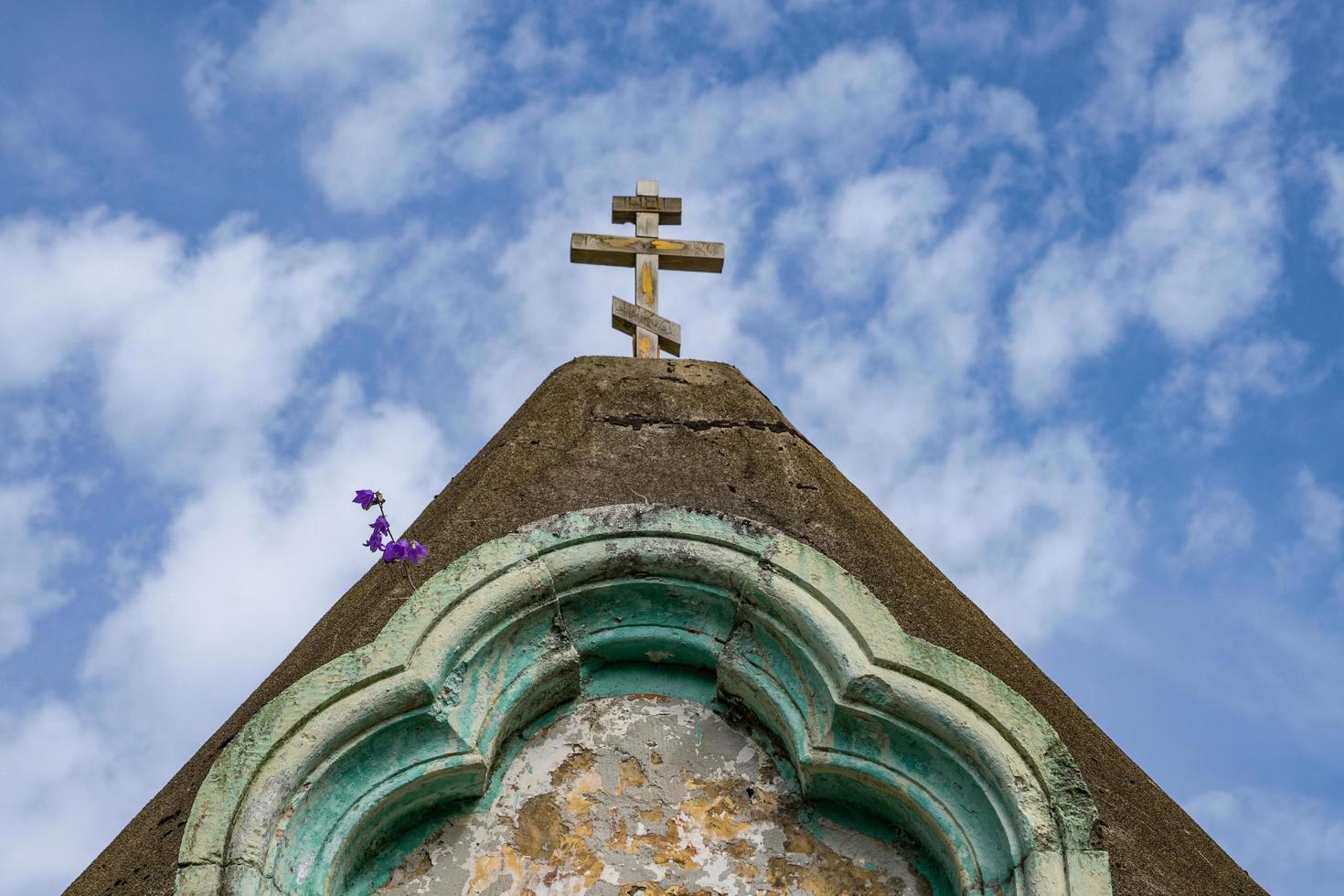 Part of an Anacopia Fortress tower with a cloudy blue sky in New Athos, Abkhazia photo