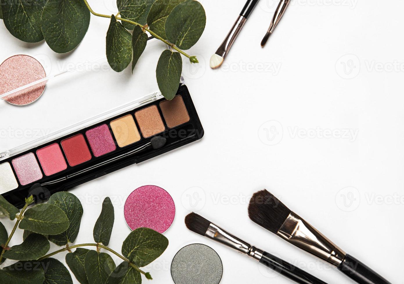 Cosmetics with green leaves photo