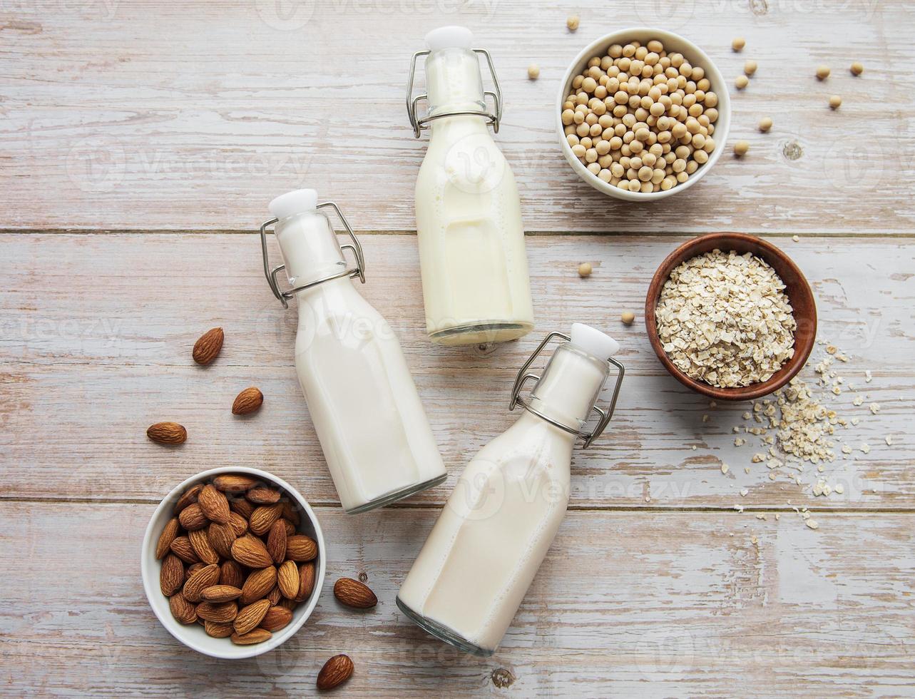 Different vegan milks flat lay photo