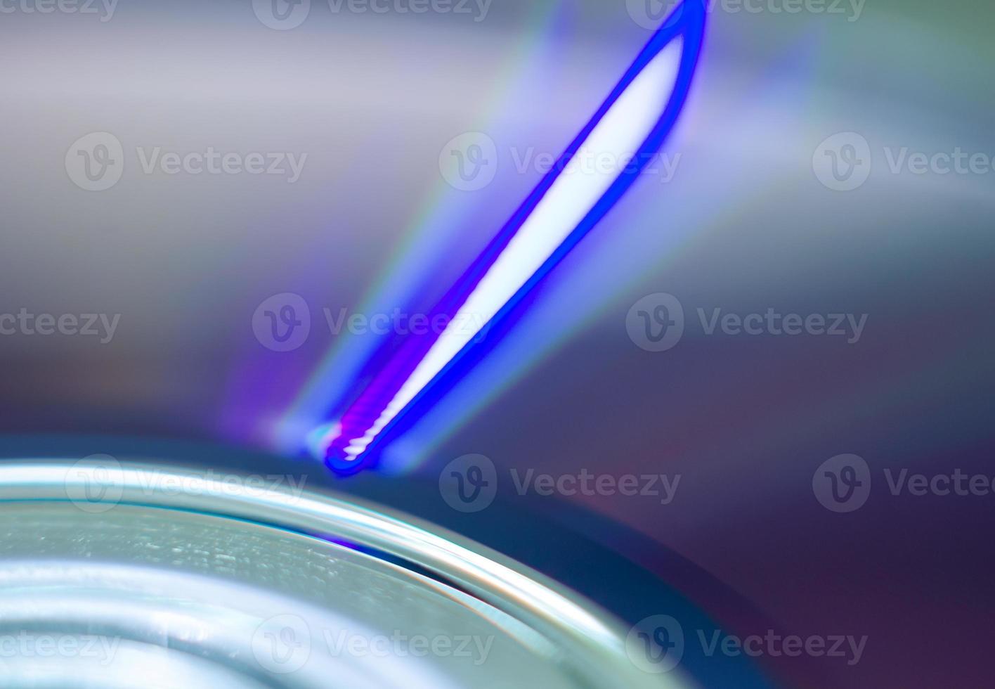 Compact disc surface, macro abstract multi-colored pattern background photo