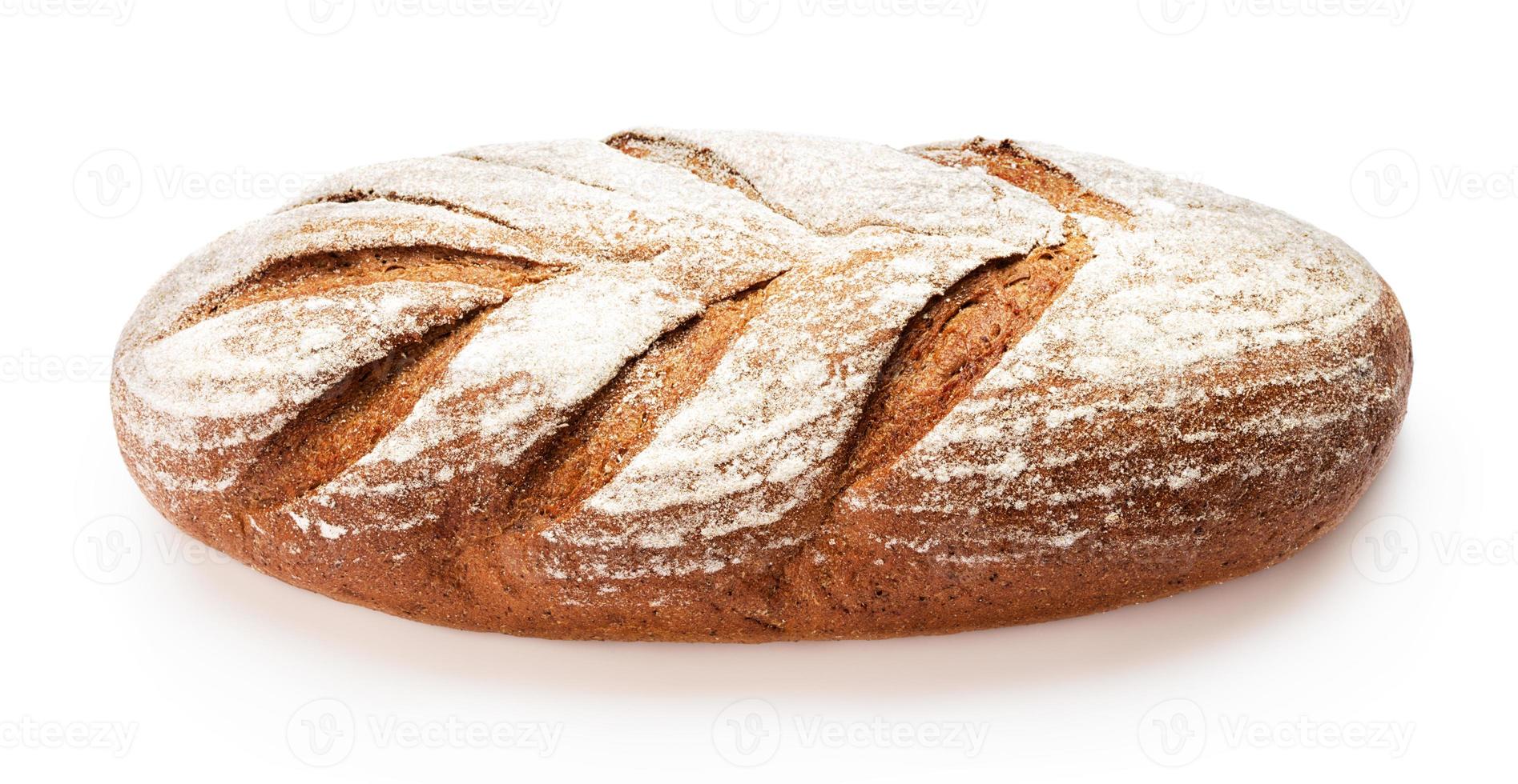 Single loaf of fresh baked bread isolated on white background photo