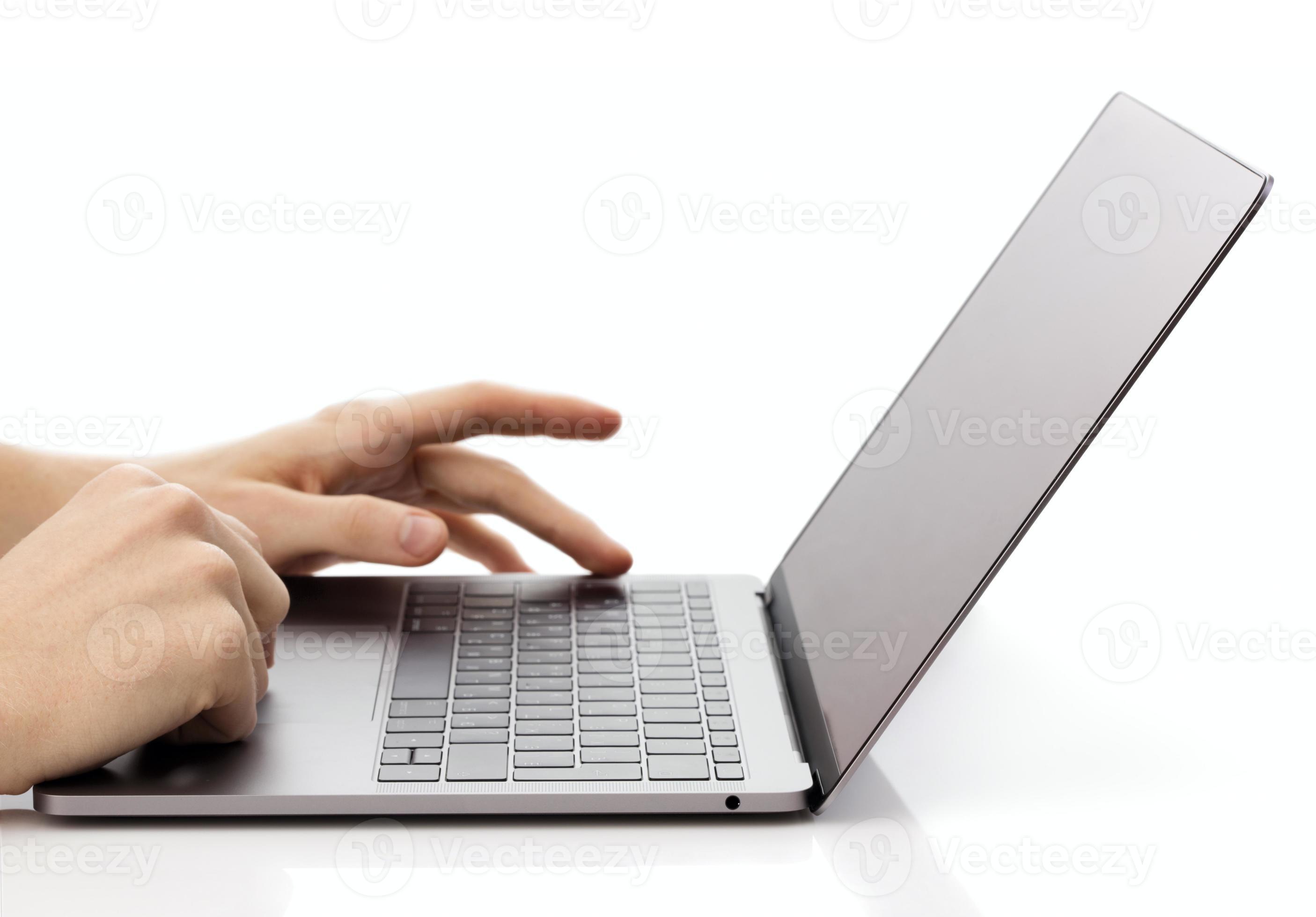 Hands typing on laptop keyboard isolated on white background 2289850