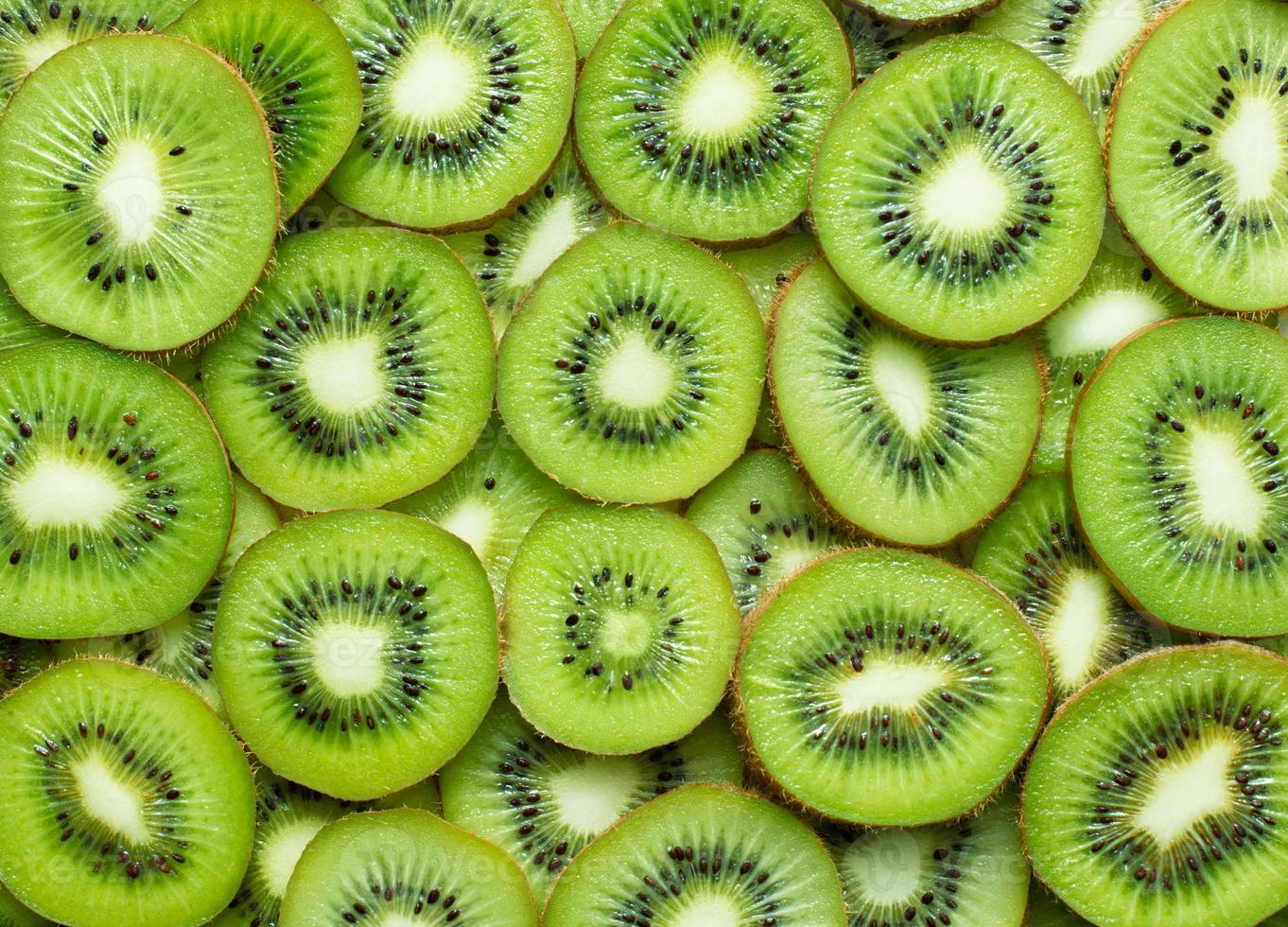 rodajas de kiwi como fondo de textura foto