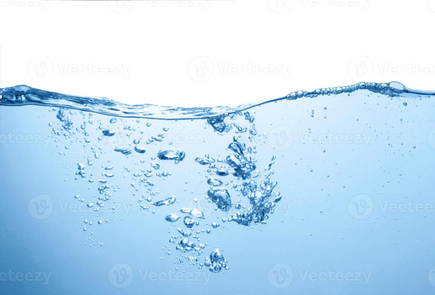Clean blue water surface with bubbles and splashes on white background photo