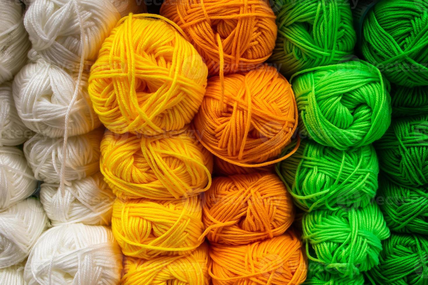 The texture of multi-colored fluffy woolen threads for knitting. photo