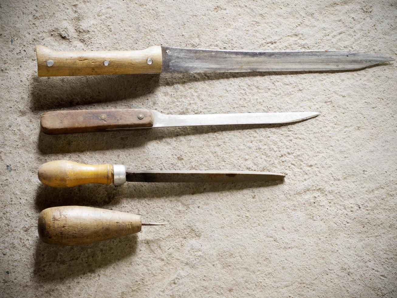 Old knives and other tools. photo