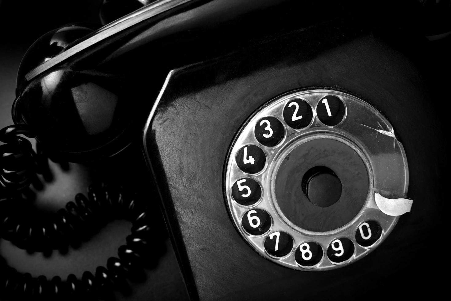 Vintage landline telephone in black and white photo