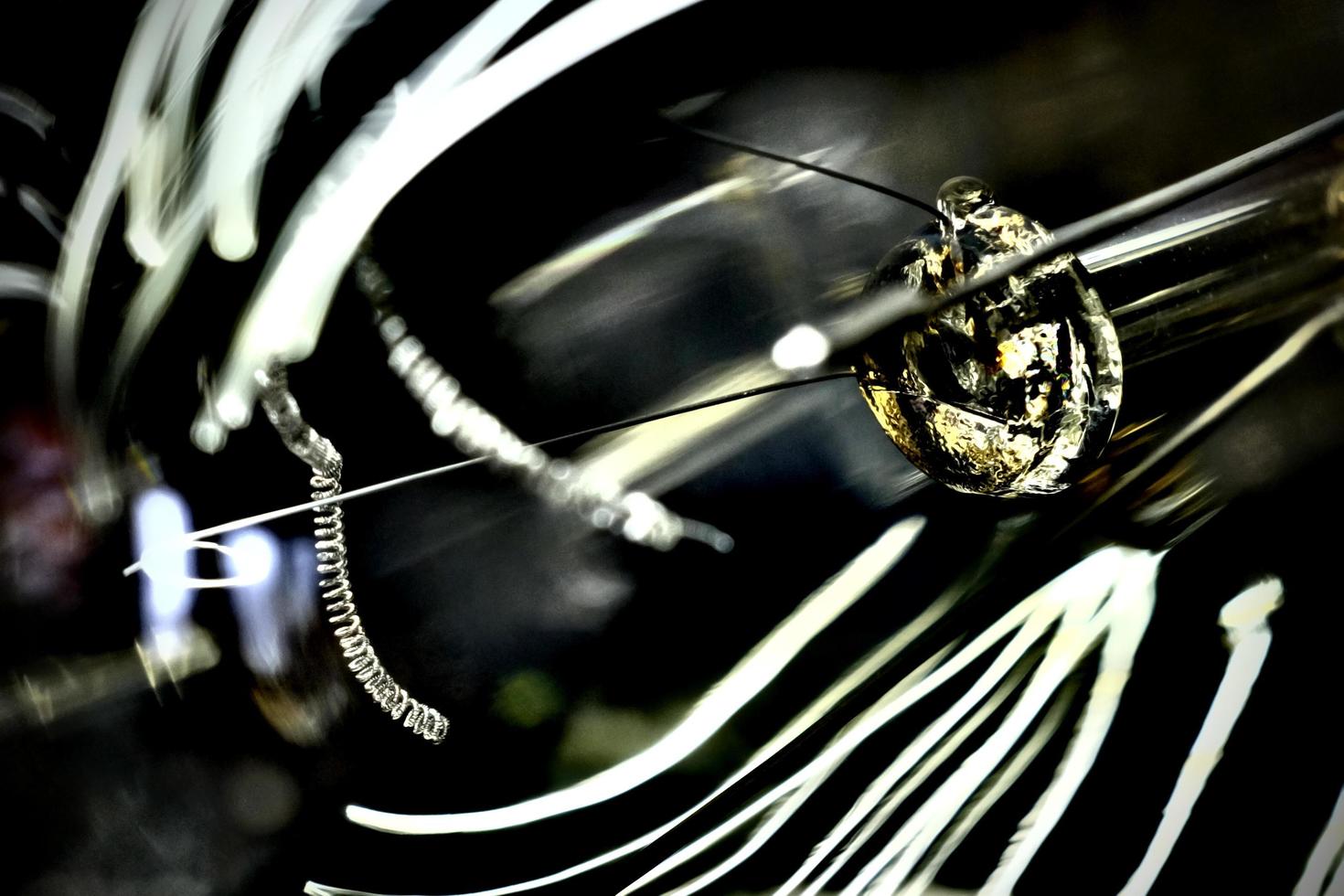 Close up image of a tungsten with abstract reflections photo