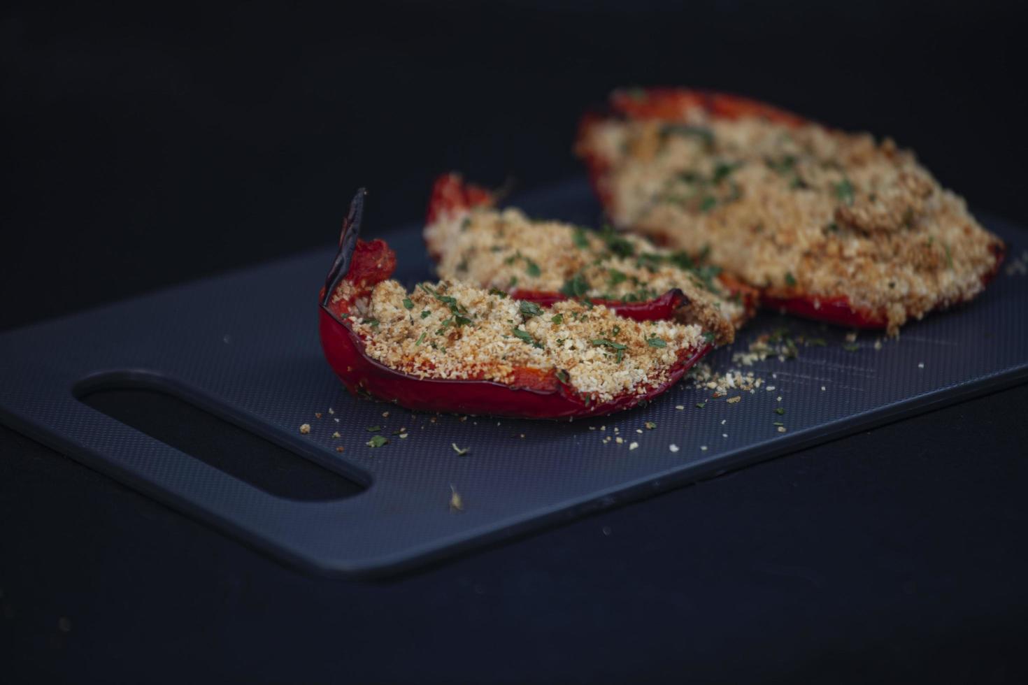 Stuffed red bell peppers photo