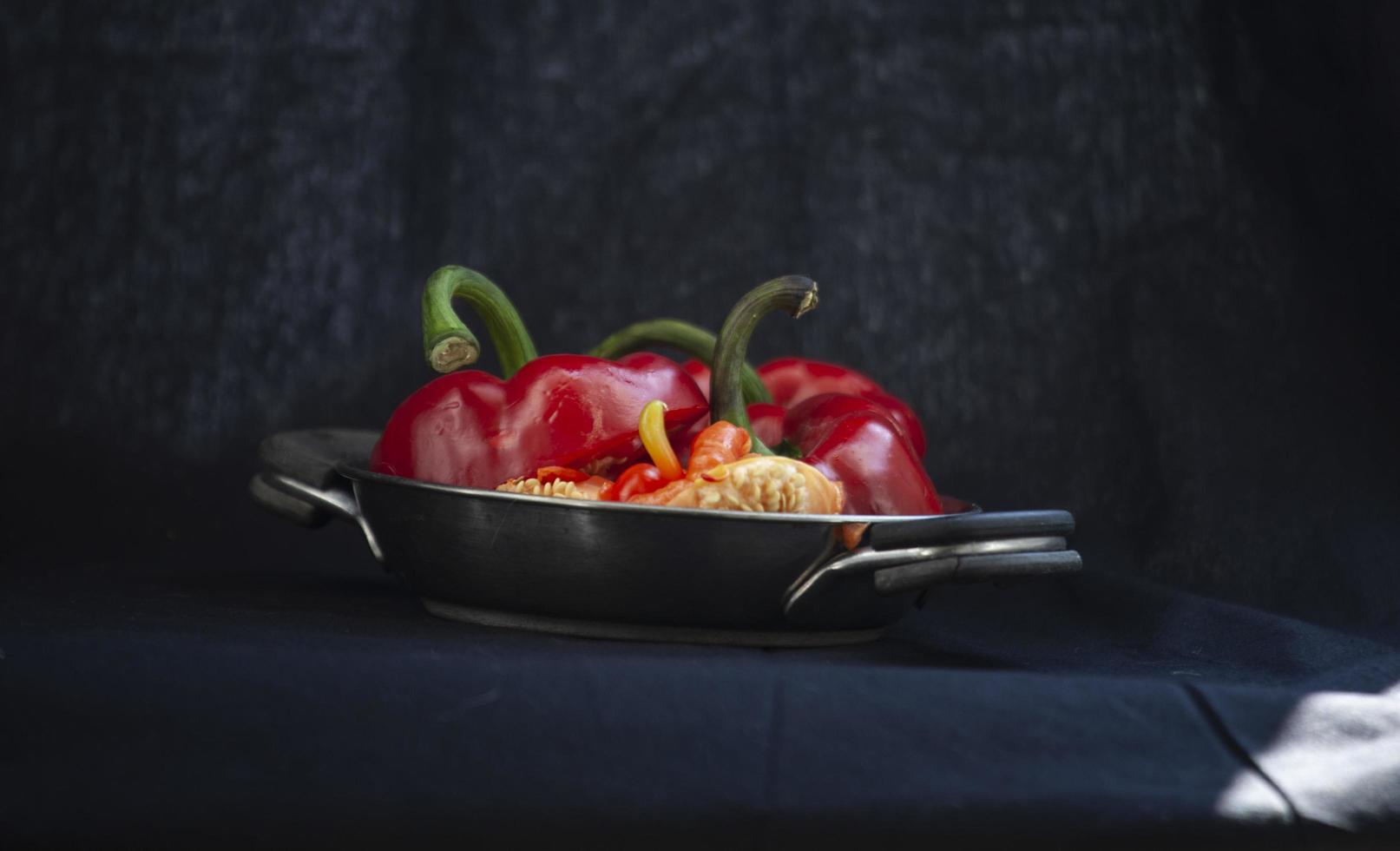 Red bell peppers on a plate photo