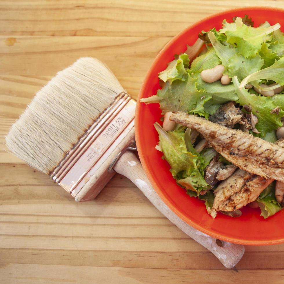 Grilled mackerel with paintbrush photo