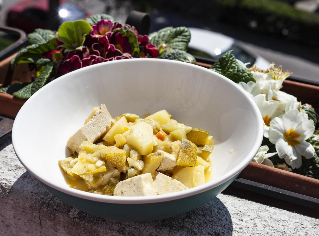 Bowl of tofu and vegetables photo