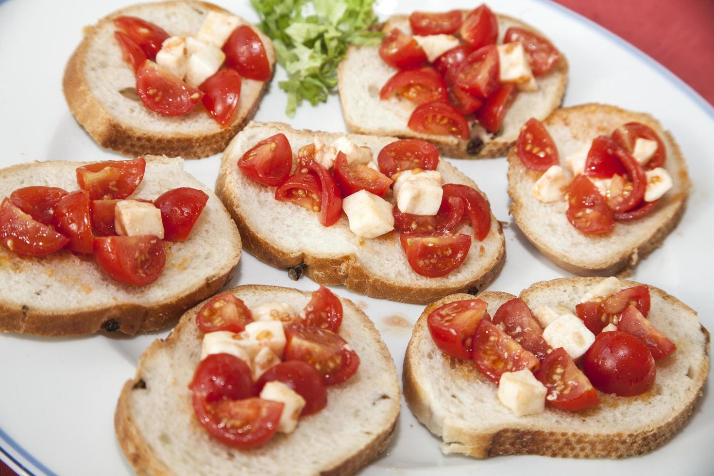 Tomato and cheese on bread photo