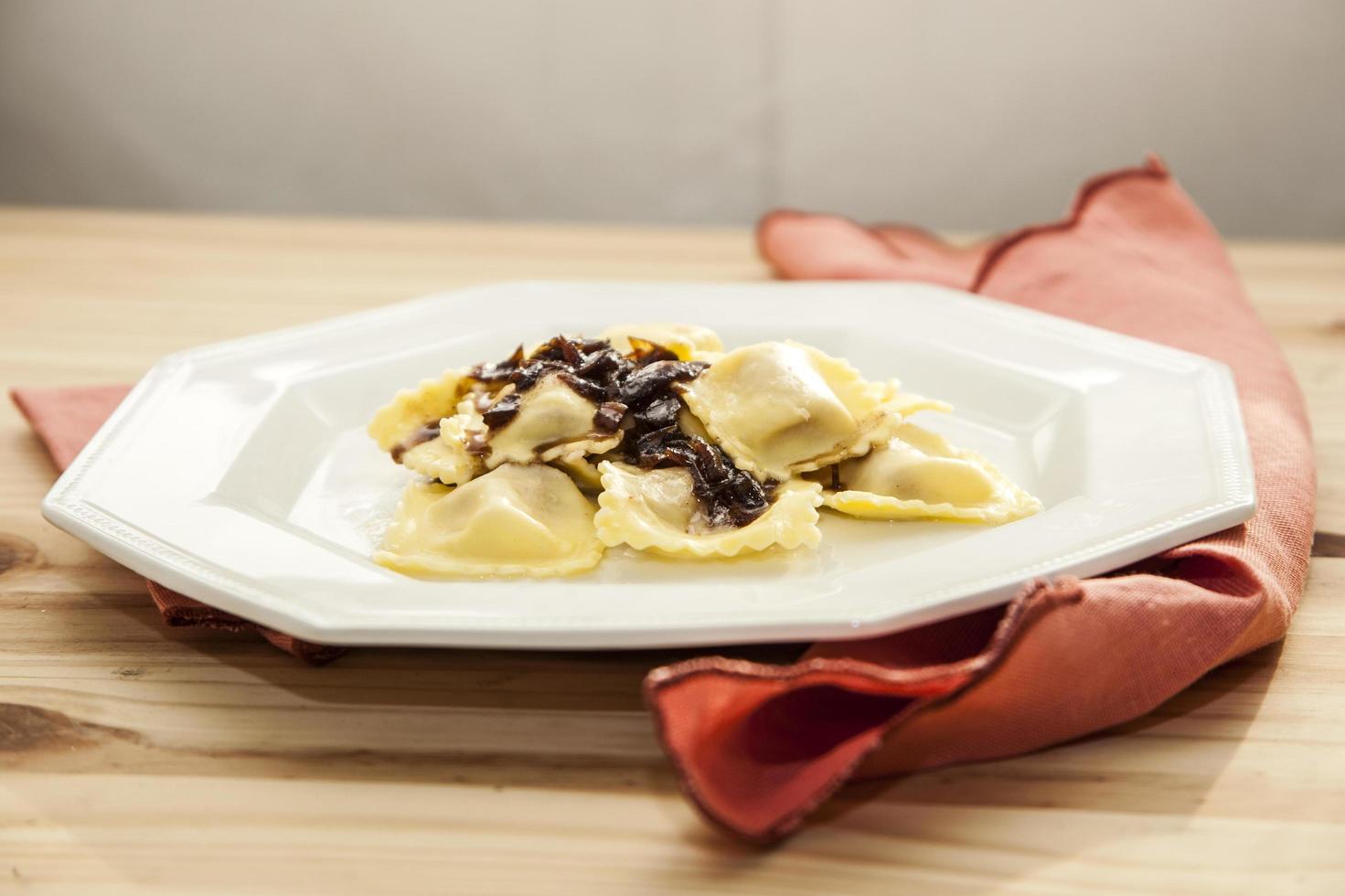 Ravioli with caramelized onion photo