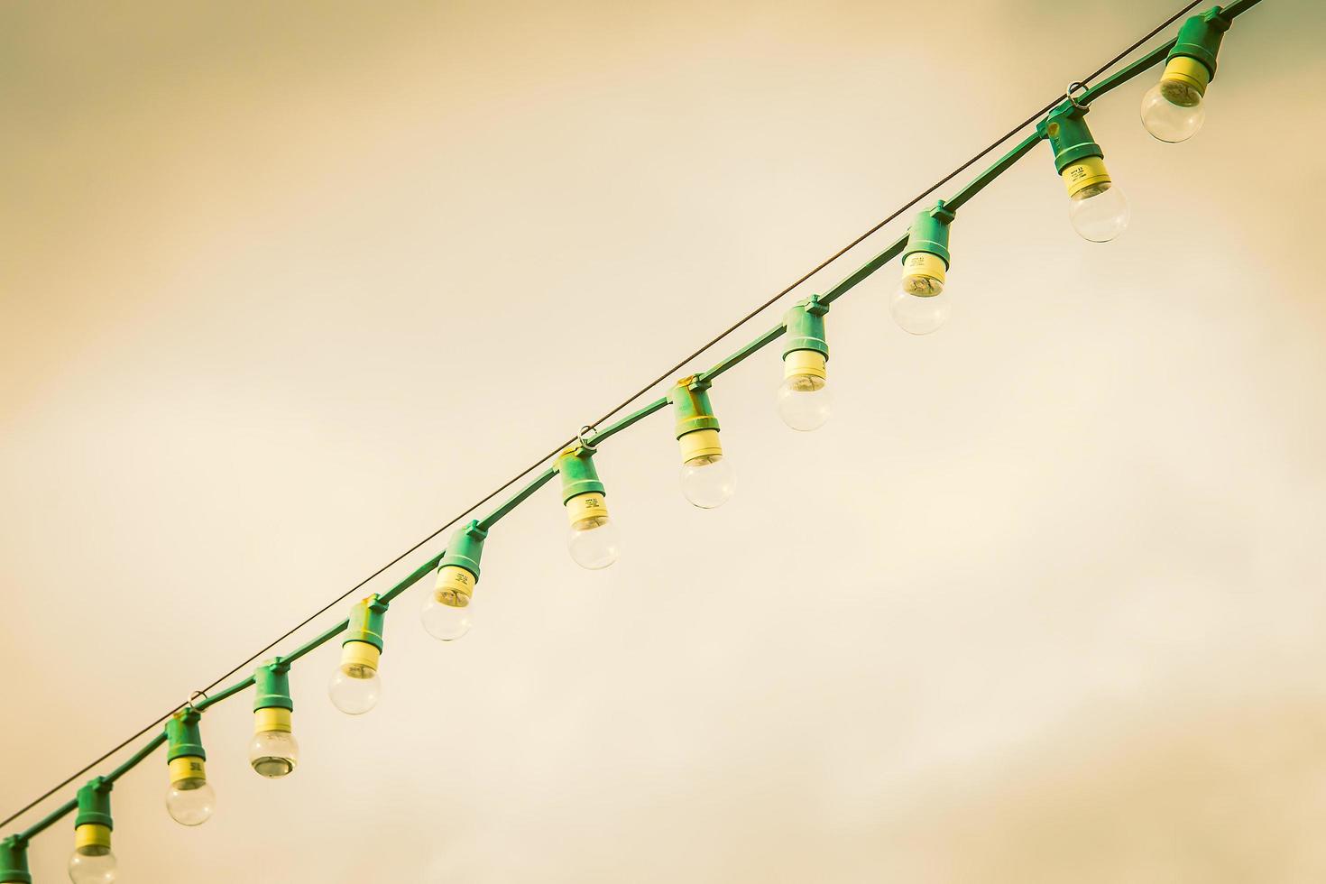 Lamps on a wire photo