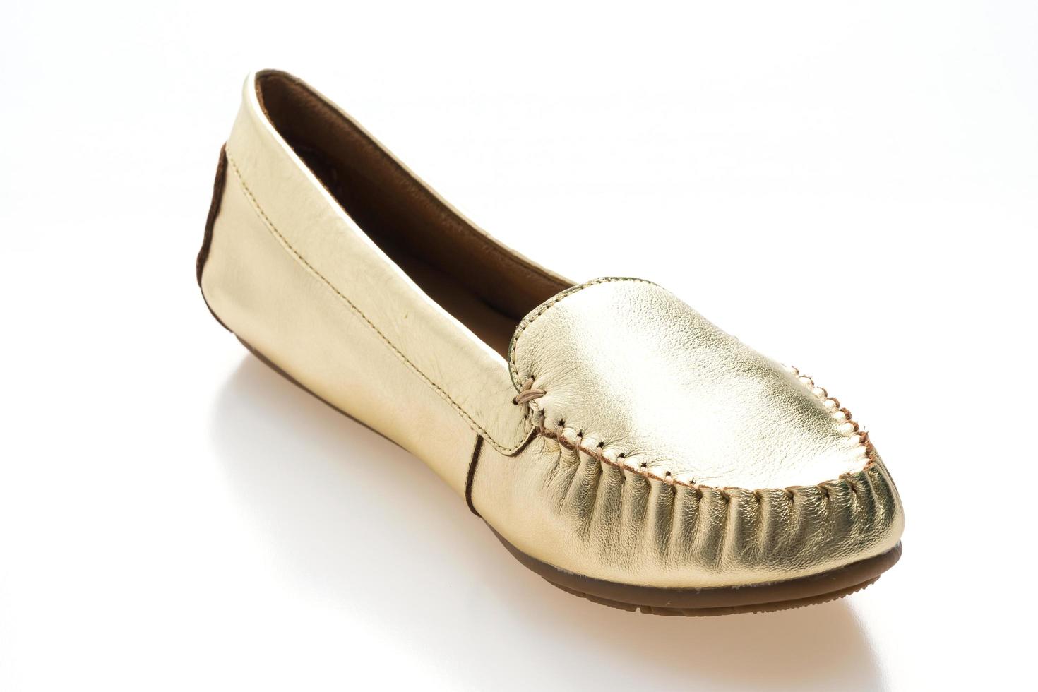 Golden woman shoes photo