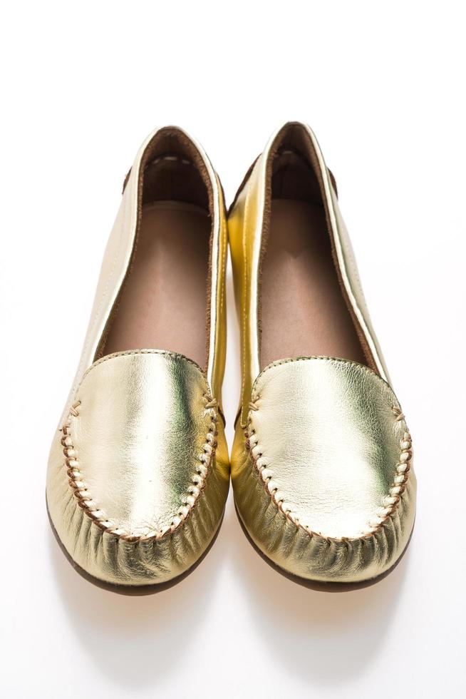 zapatos de mujer dorados foto