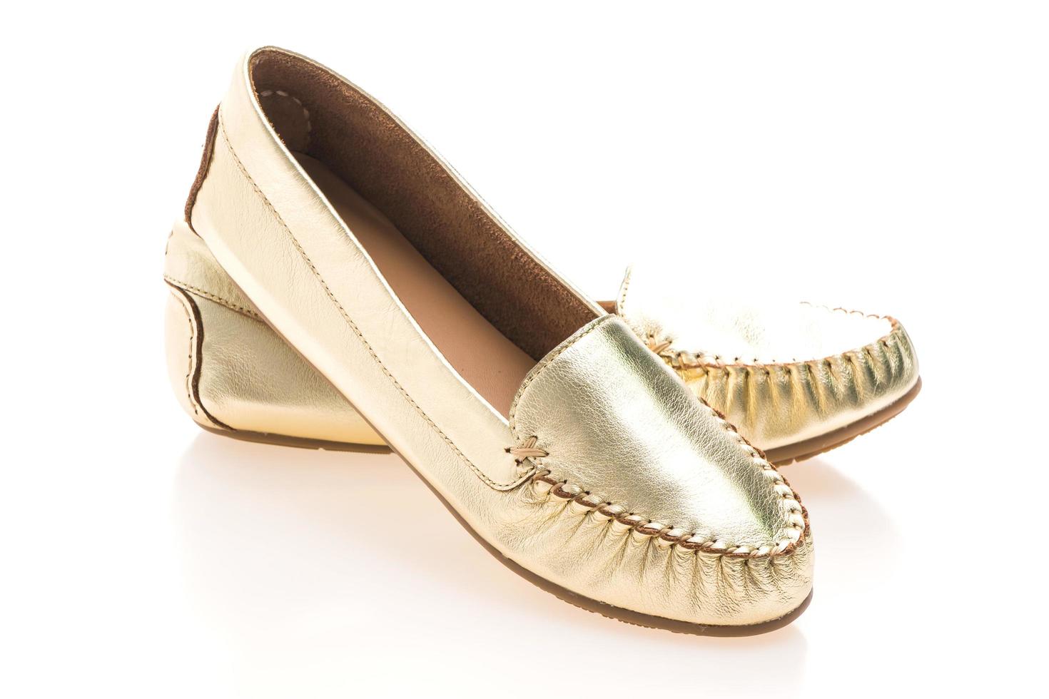 Golden woman shoes photo