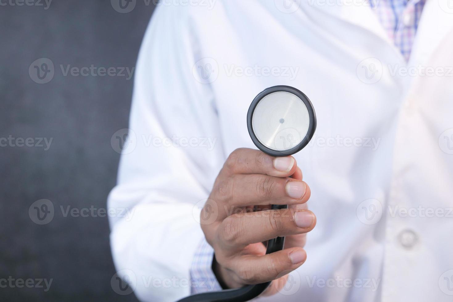 Doctor using a stethoscope photo