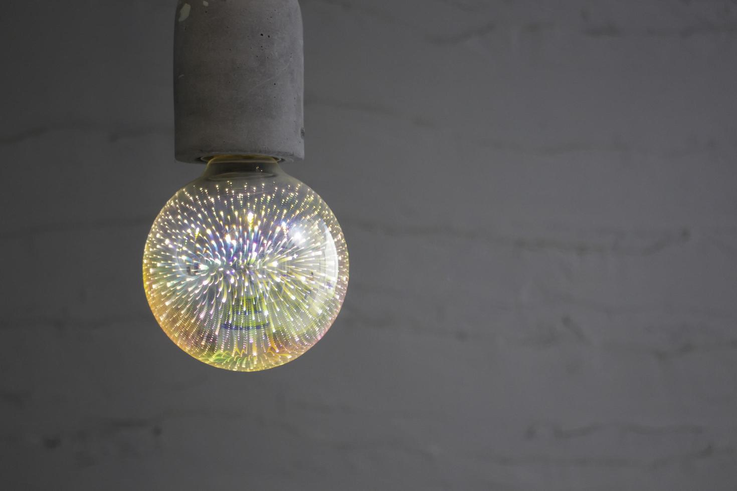 Modern light bulb in living room photo