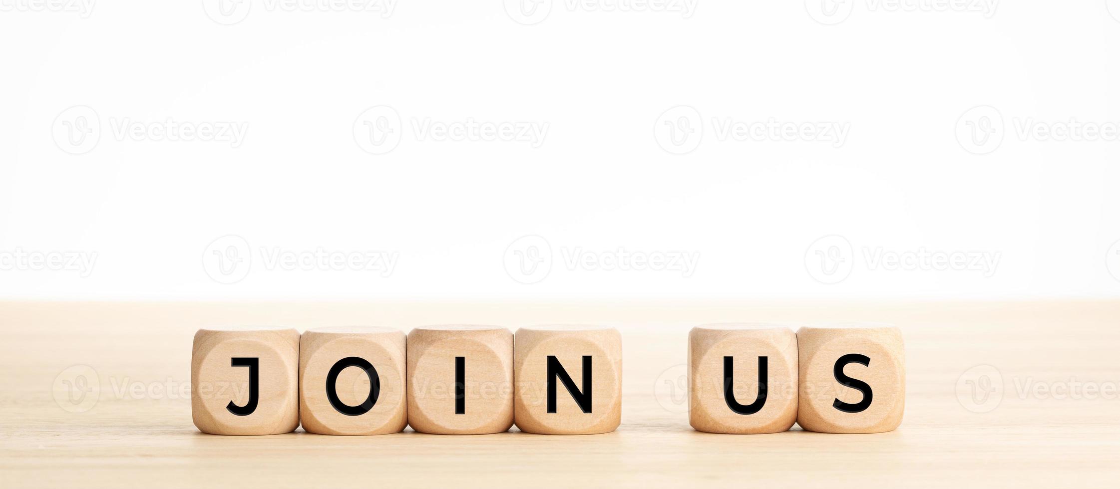 Join now word on wooden blocks on wood table photo