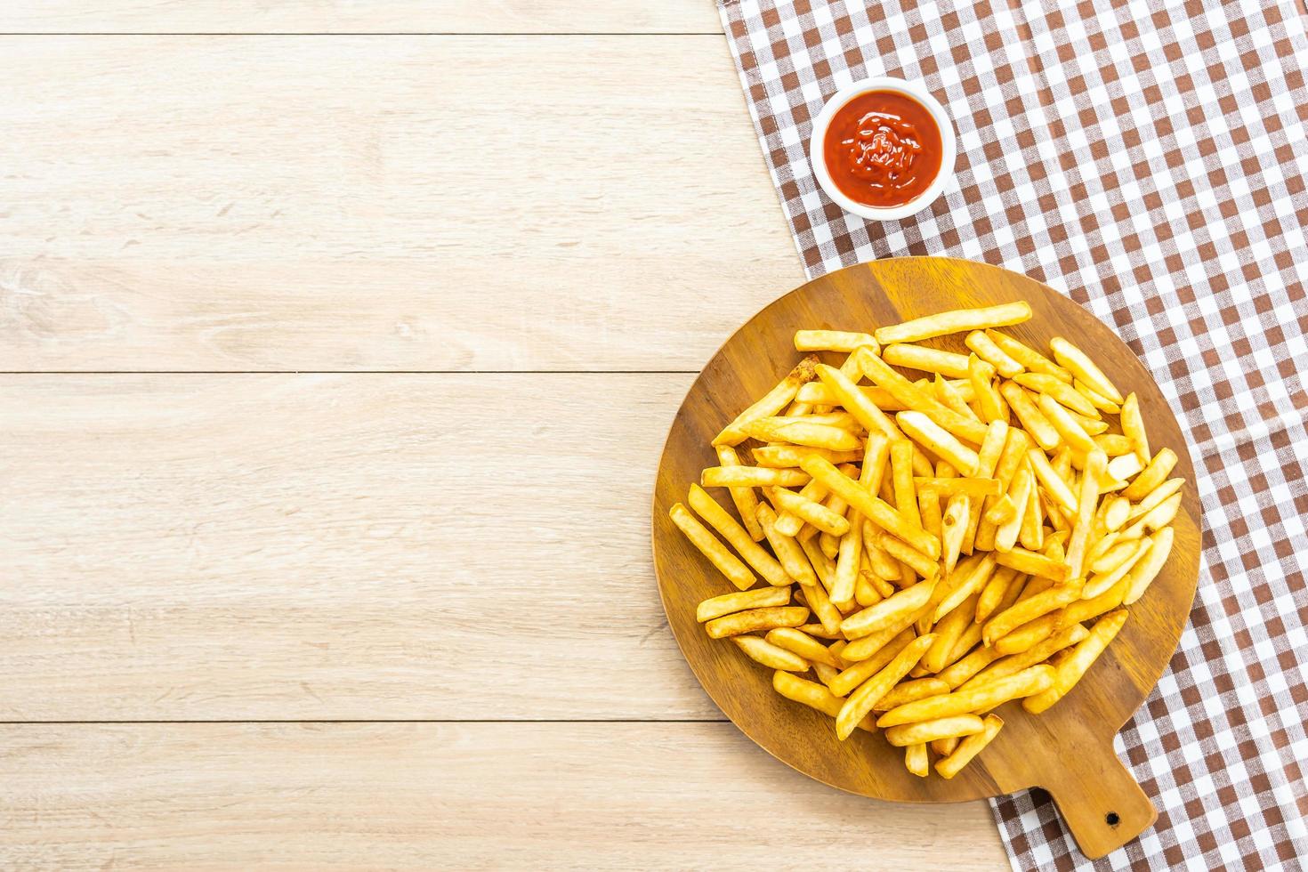 French fries with tomato or ketchup sauce photo