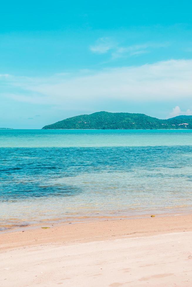 Beautiful outdoor view with tropical sea ocean and beach photo