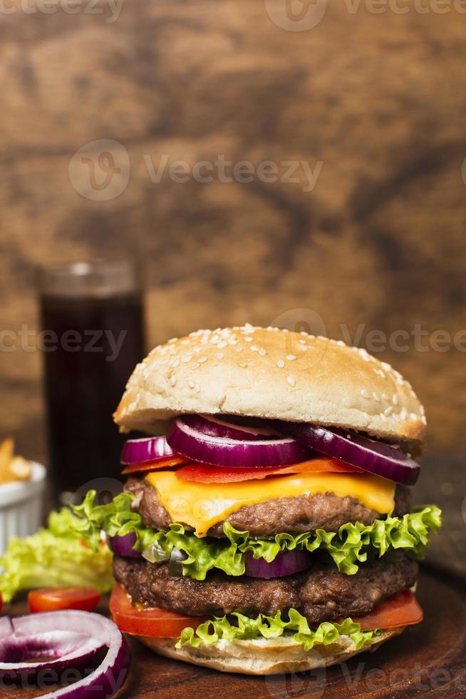 Close-up burger on wooden tray photo