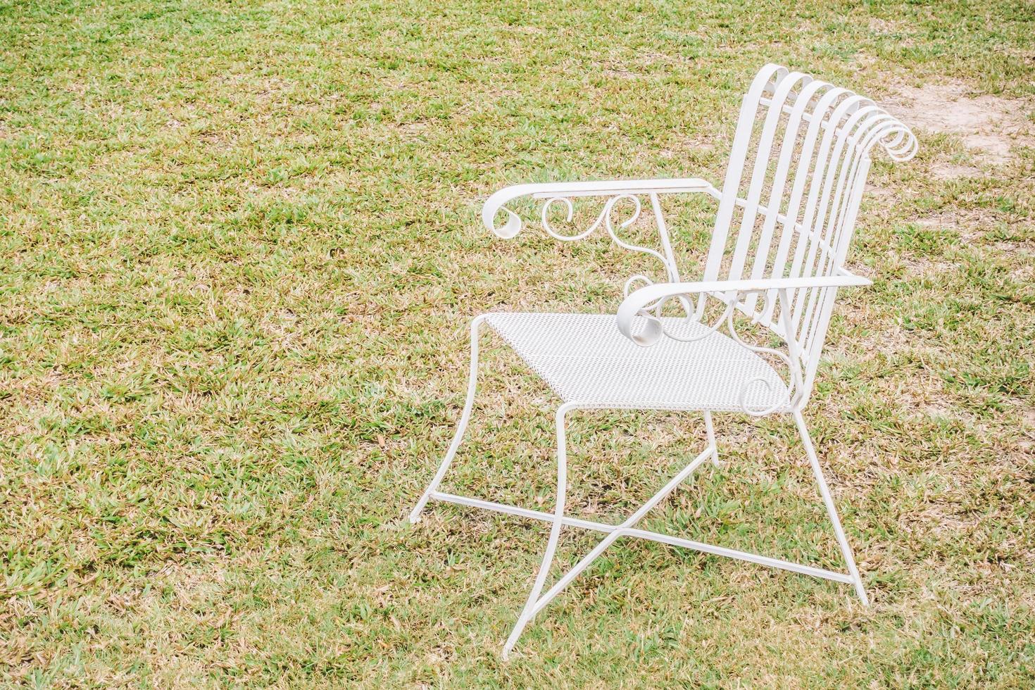 Empty chair in the garden photo