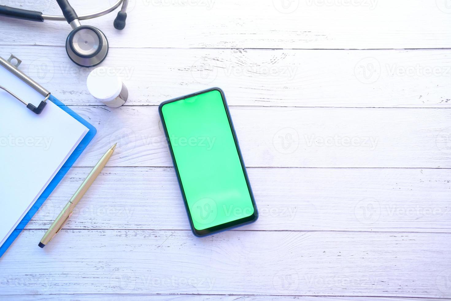 Phone flat lay with medical items mock-up photo