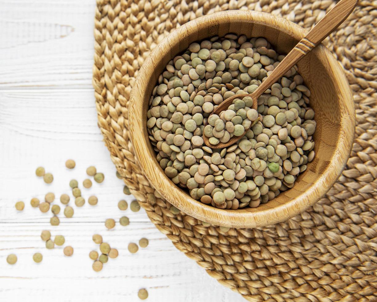 Raw lentil on a table photo