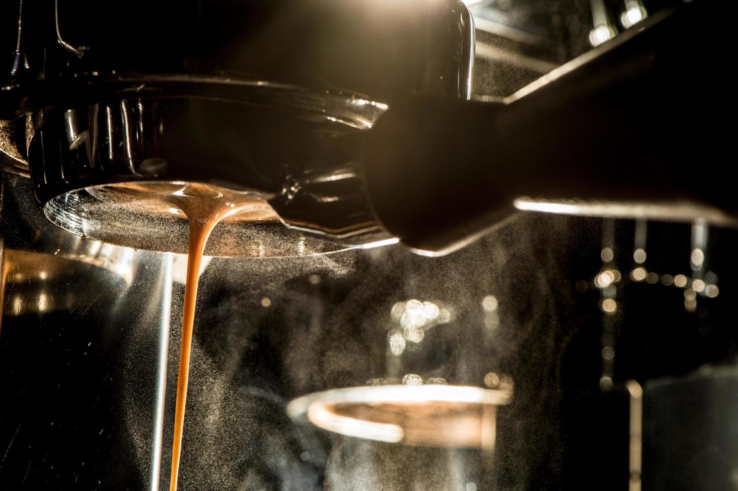 Espresso machine brewing a coffee. photo