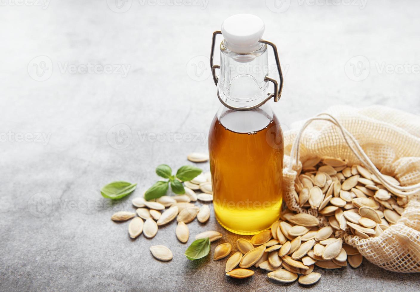 Bottle with pumpkin seed oil photo