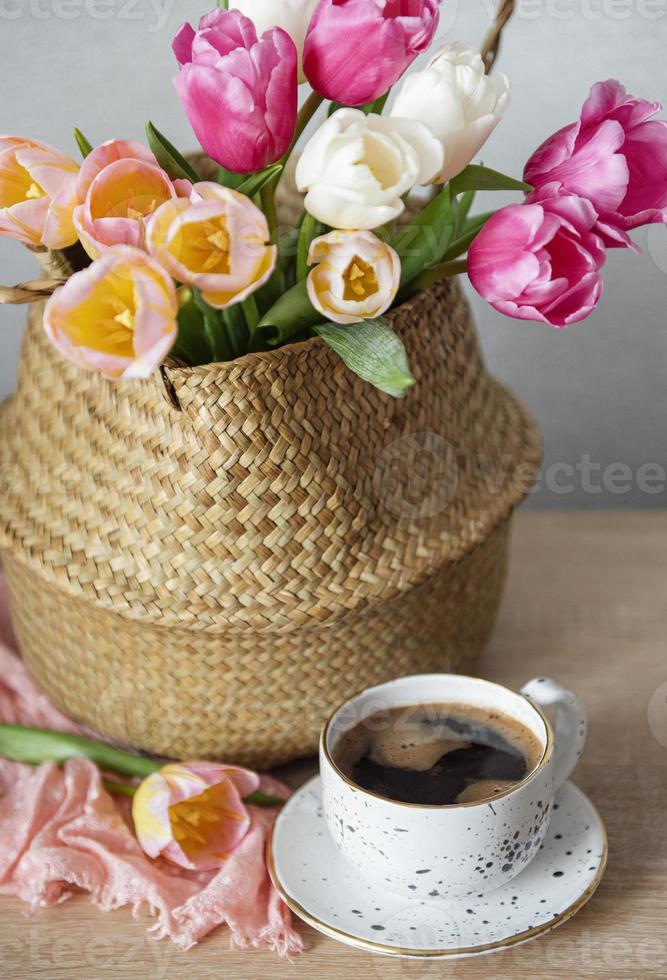 Basket with spring colorful tulips photo