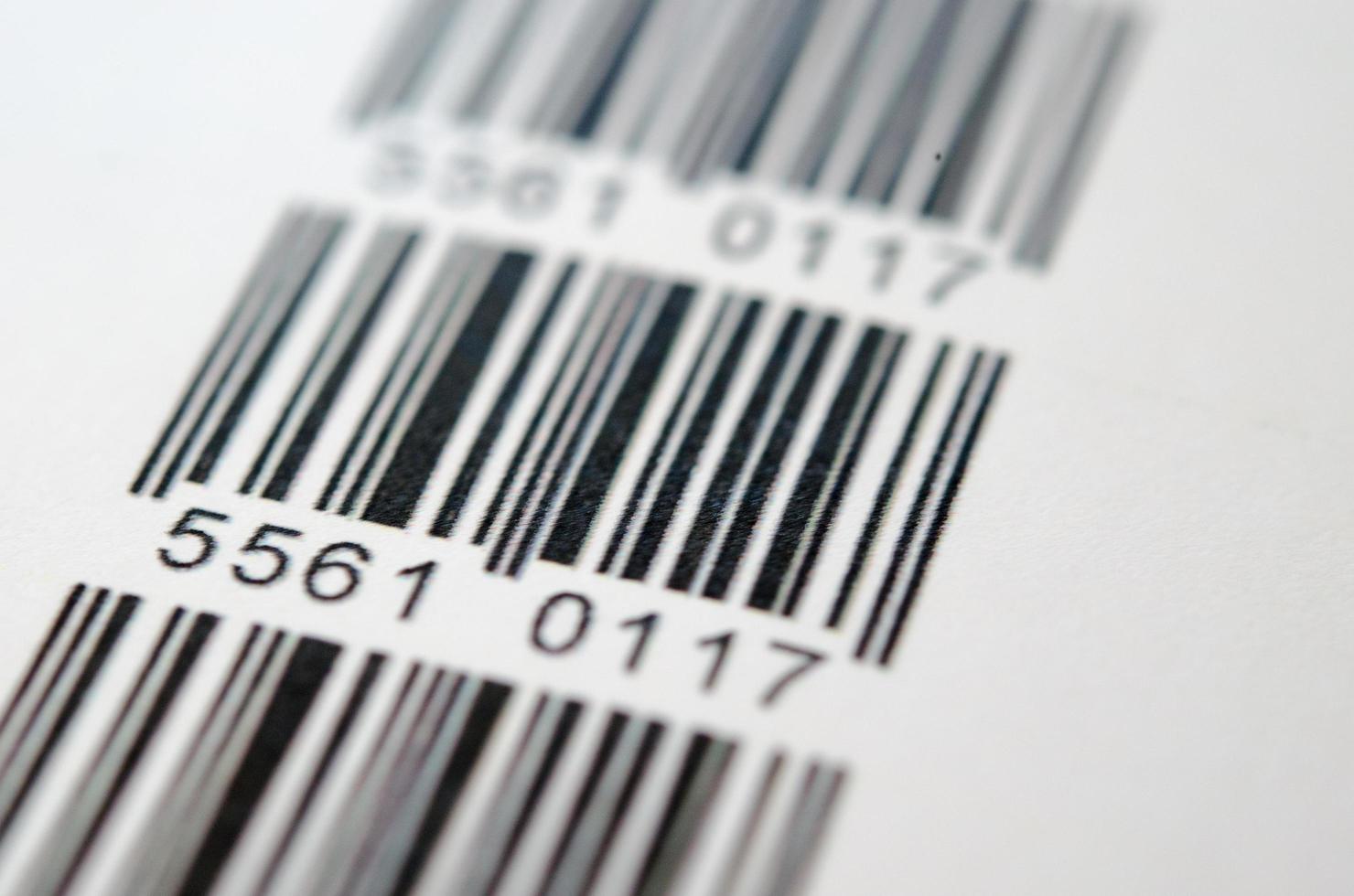 Digital barcode scanned over white background photo