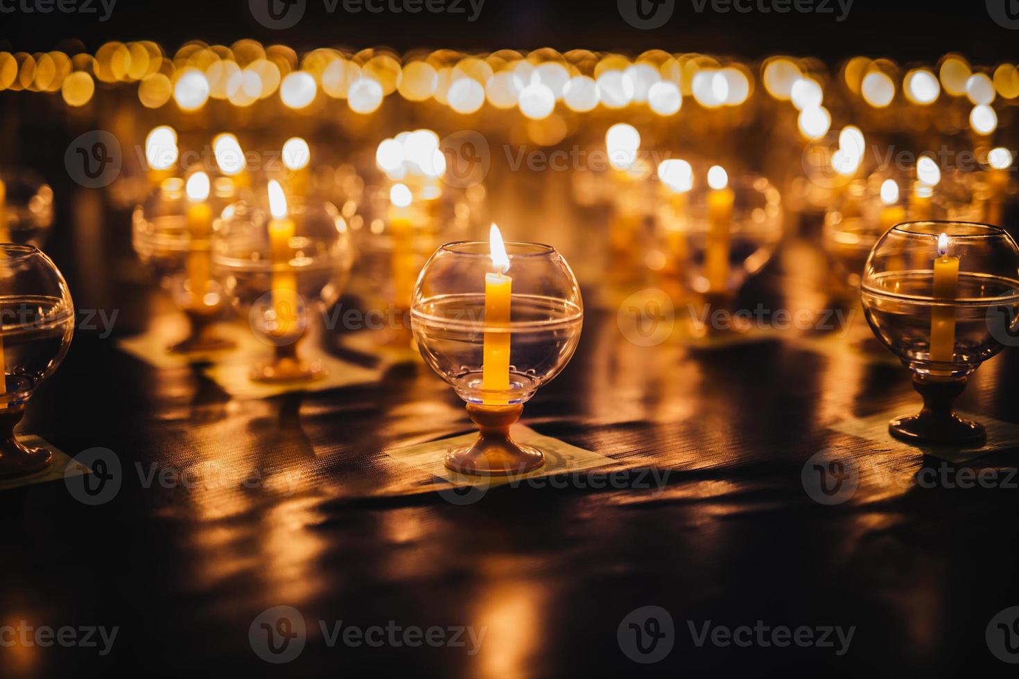 Candles on the floor decorated for prayer photo