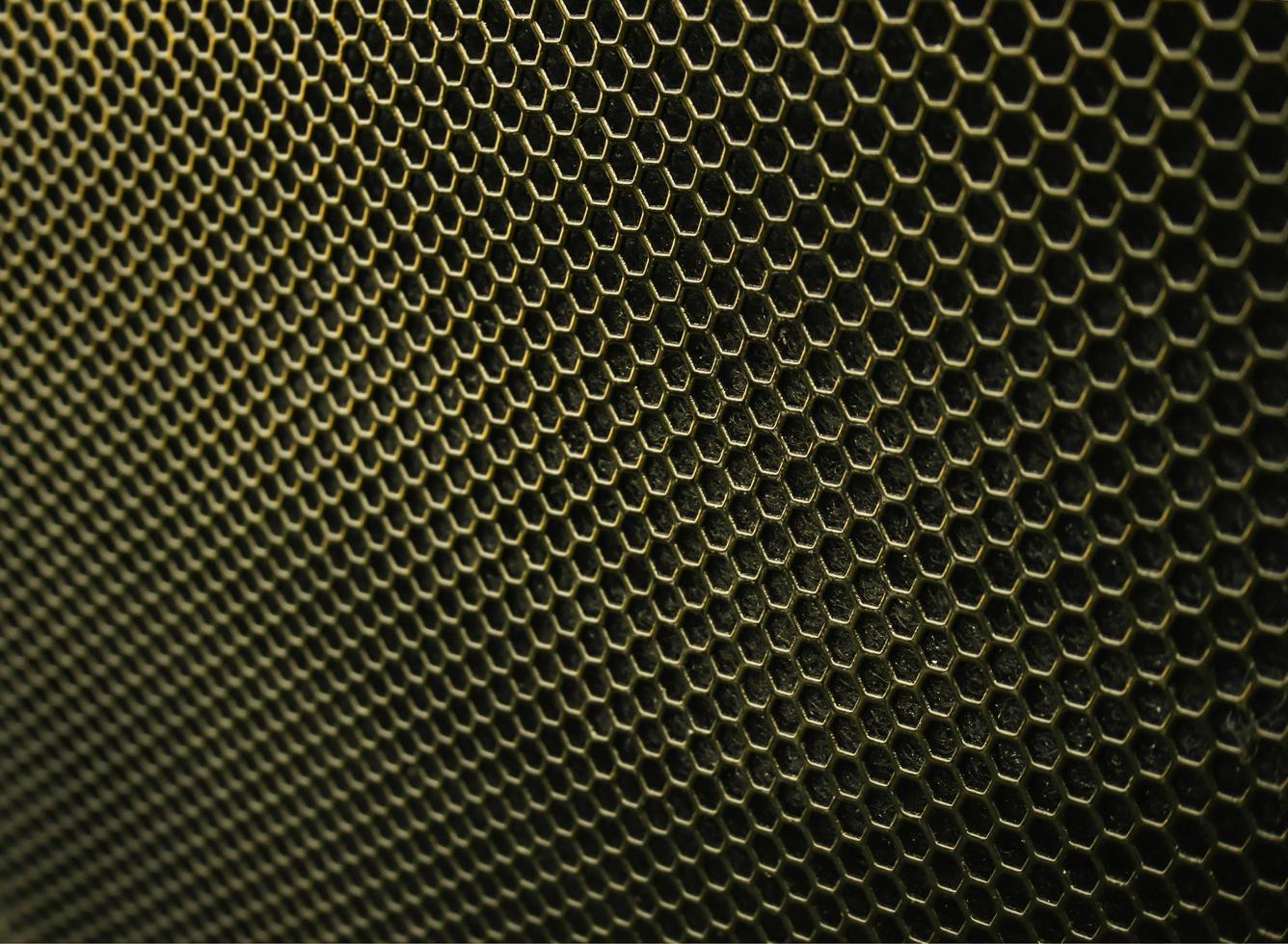 textura hexagonal de hierro dorado foto