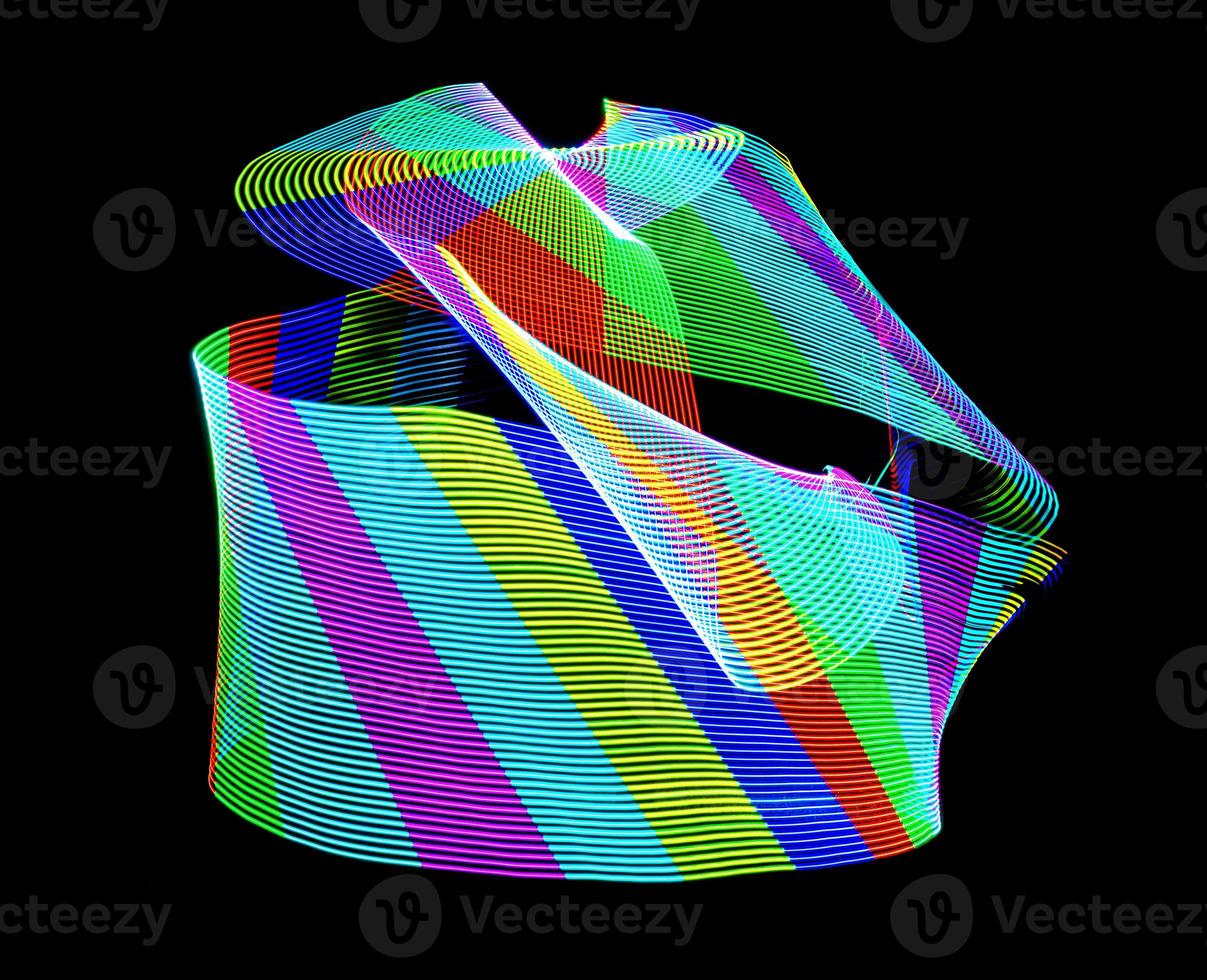Abstract structure of colored light painting against a black background photo