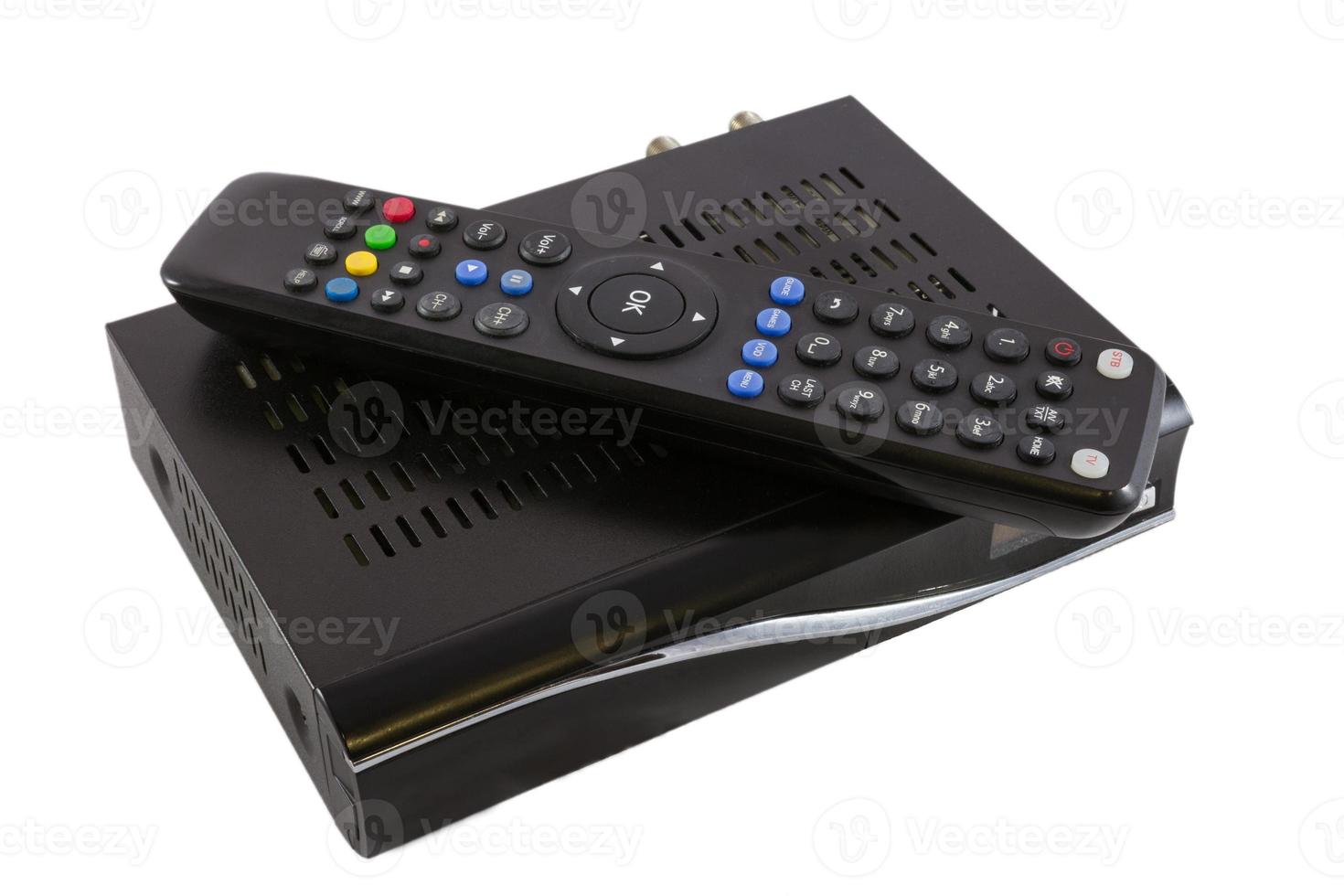 Remote and receiver for satellite TV on white background photo