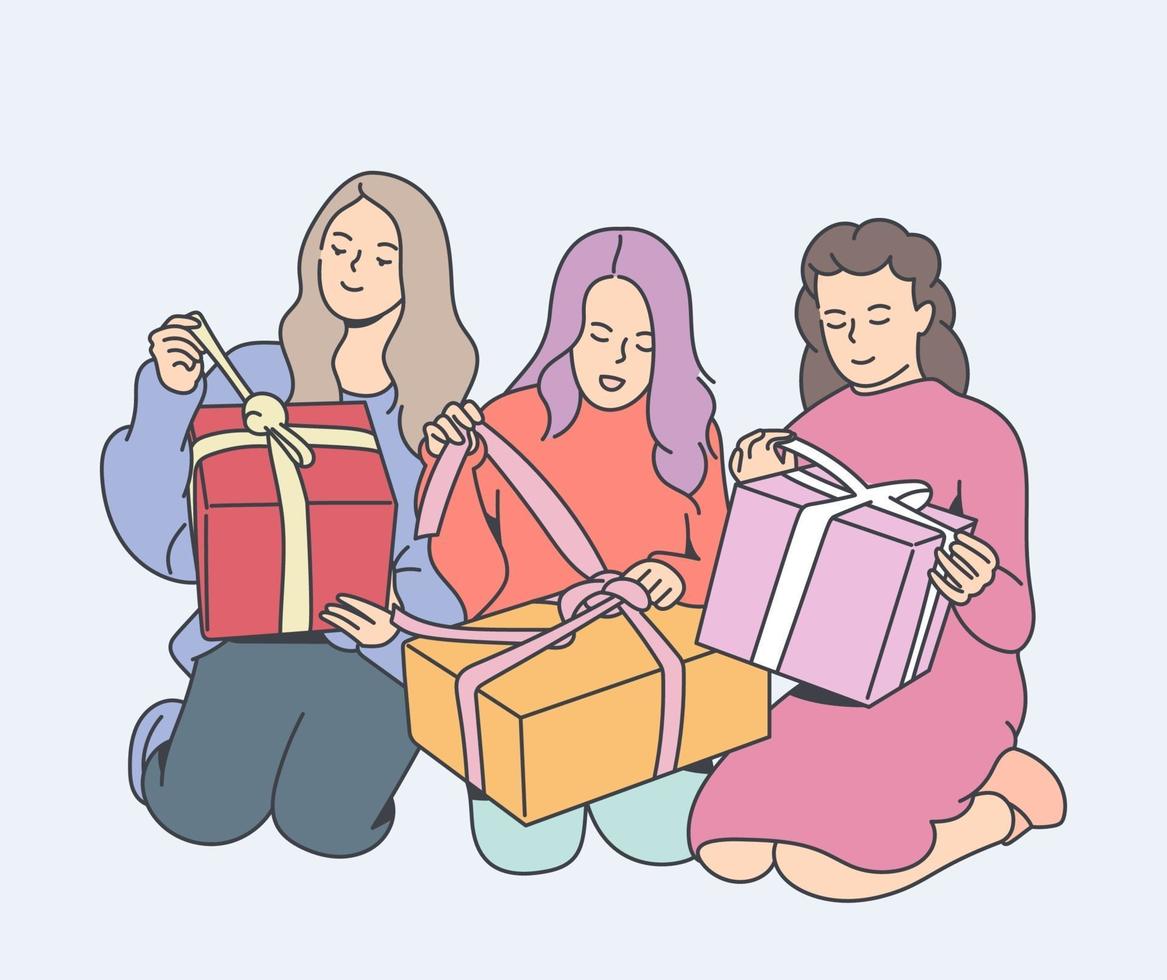 vacaciones, regalos, concepto de celebración. hermanas jóvenes felices pasaron tiempo en casa. niñas con regalo de navidad. hermanas juntas. vector