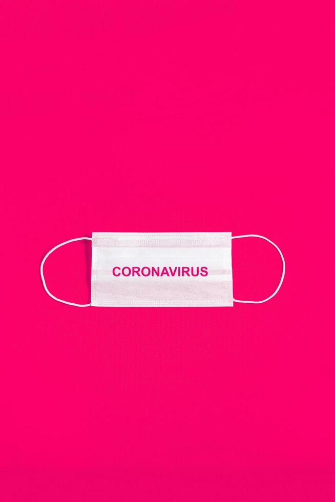 Surgical mask over minimalist pink background 2310758 Stock Photo at
