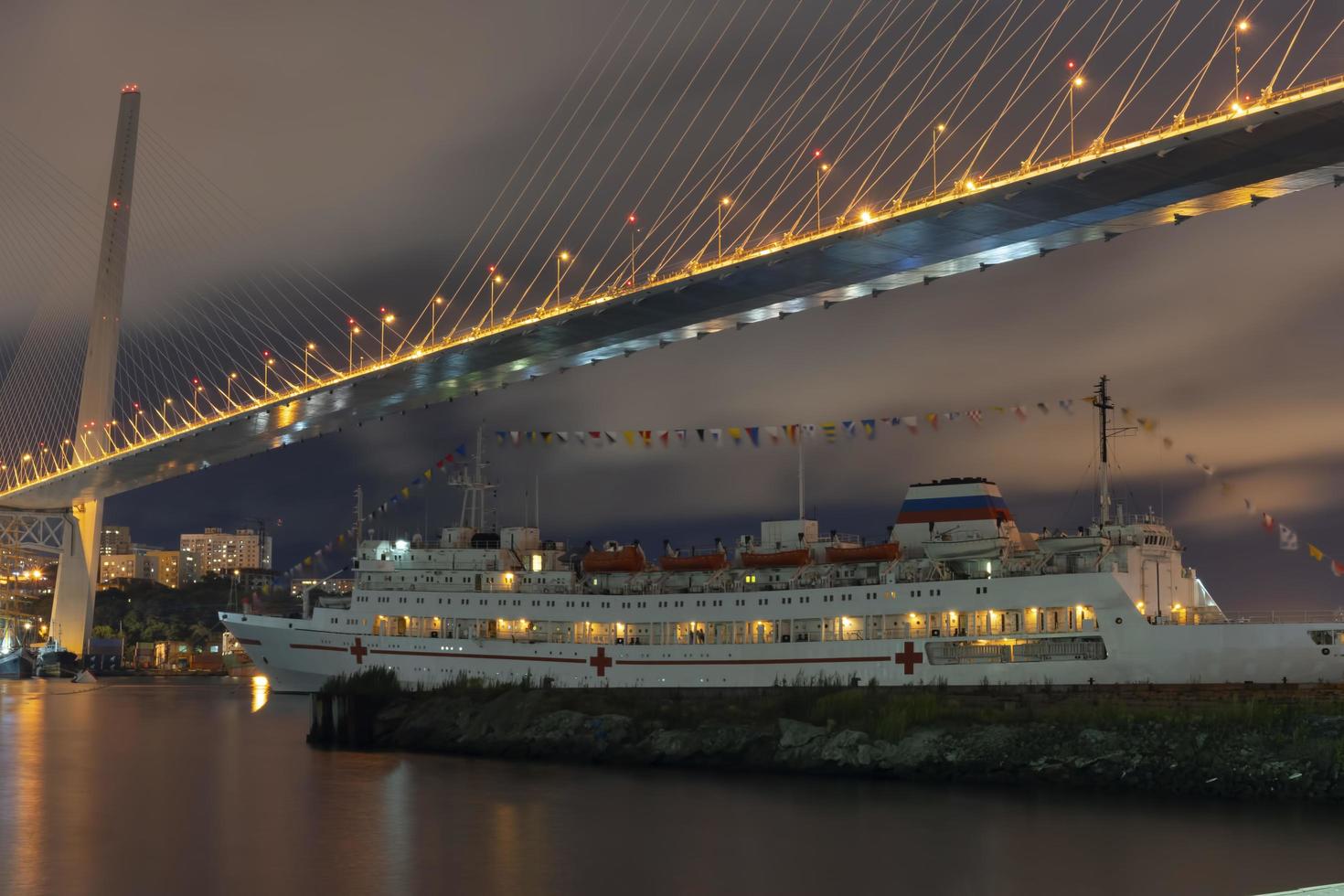 Night landscape with views of the Golden Horn Bay and the ship. photo