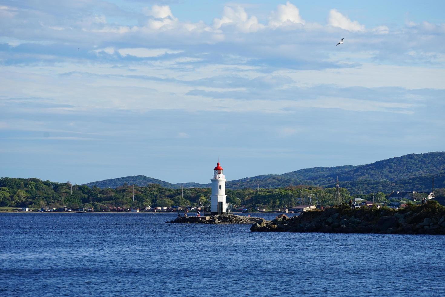 Tokarev lighthouse on the background of the seascape. photo